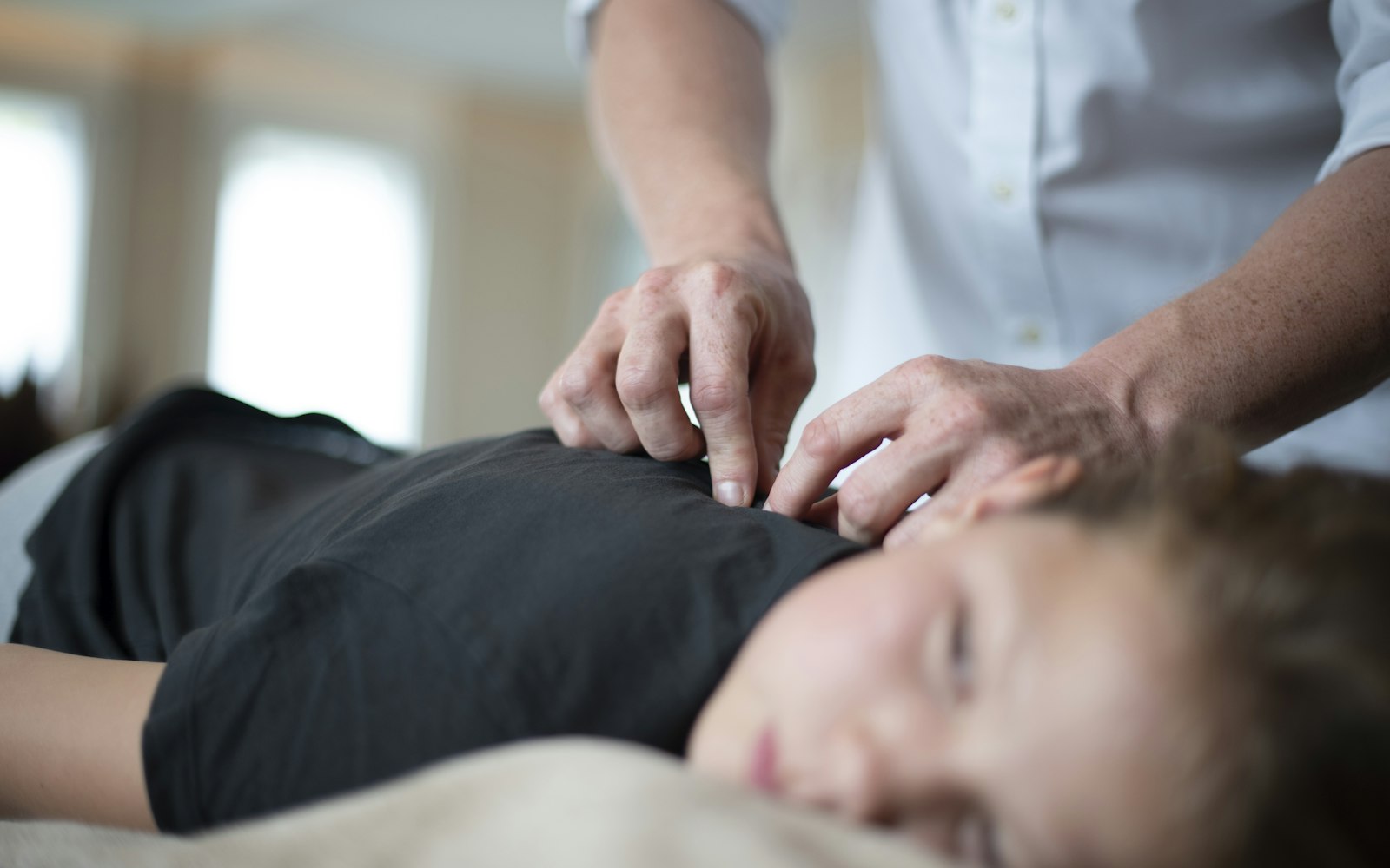 A chiropractic adjustment in progress